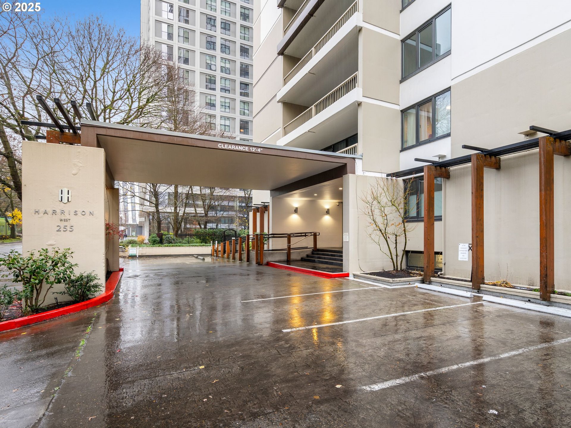 255 Southwest Harrison Street, Unit 3C Portland, OR 97201 - Photo 3 of 32 a view of a building with floor to ceiling windows and walls