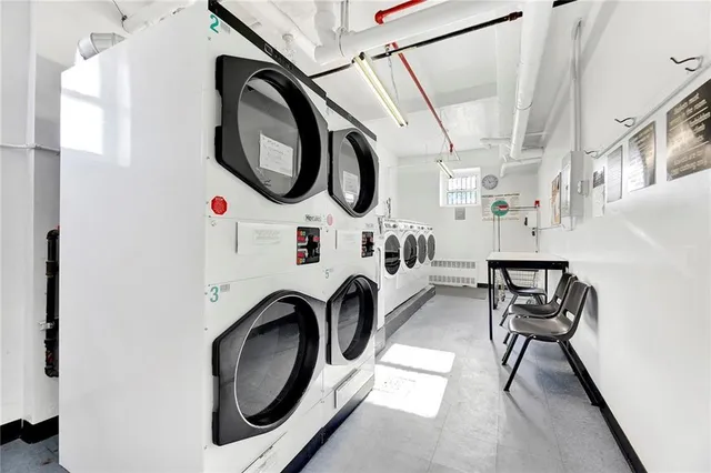 a utility room with dryer and washer