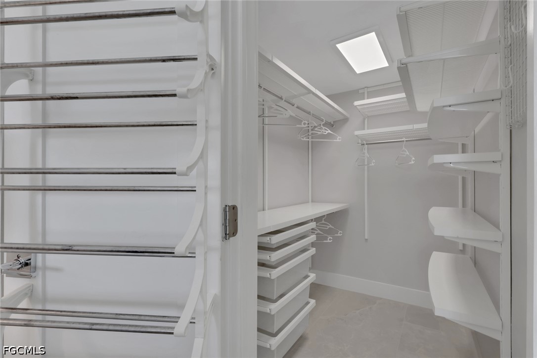 9 High Point Circle North, Unit 101 Naples, FL 34103 - Photo 25 of 49 a view of walk in closet