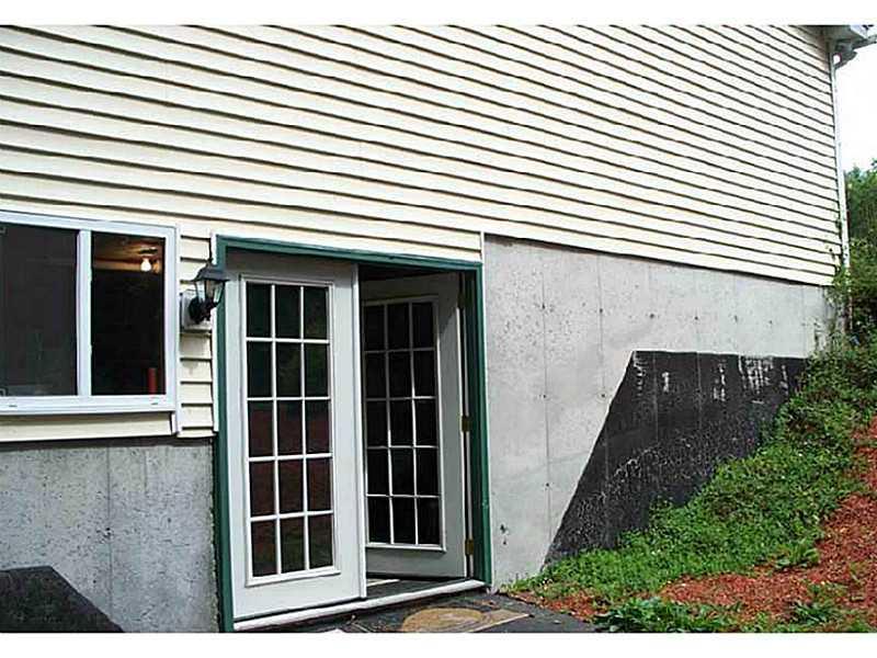 815 Lebanon Street Sanford, ME 04073 - Photo 5 of 26 Exterior Side View. basement walk out