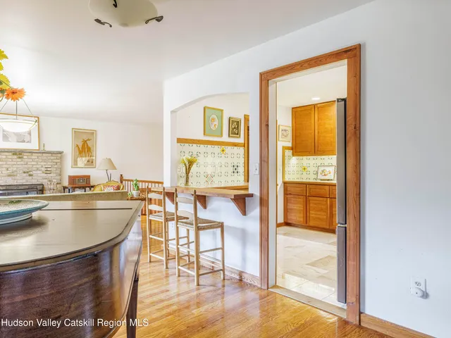 a very nice looking living room with a large window
