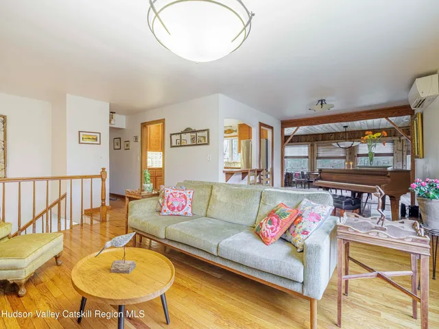 a living room with furniture and a table