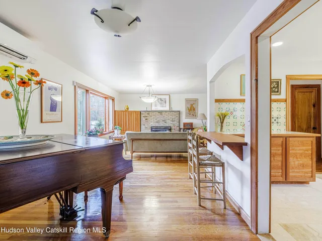 a view of a living room and kitchen