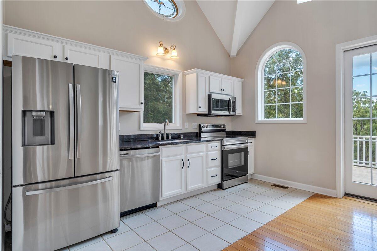 2011 Deep Woods Road Hardy, VA 24101 - Photo 13 of 94 a kitchen with stainless steel appliances a refrigerator sink and microwave