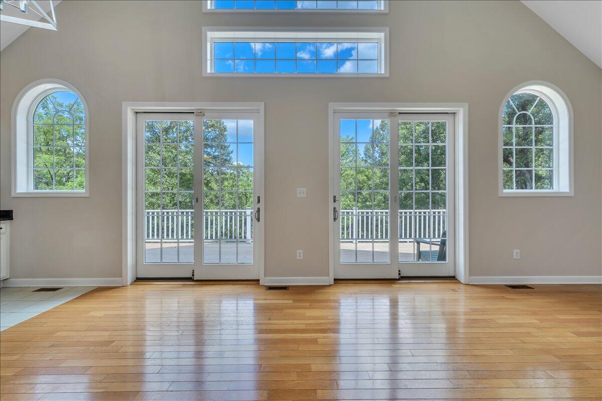 2011 Deep Woods Road Hardy, VA 24101 - Photo 14 of 94 an empty room with wooden floor and windows
