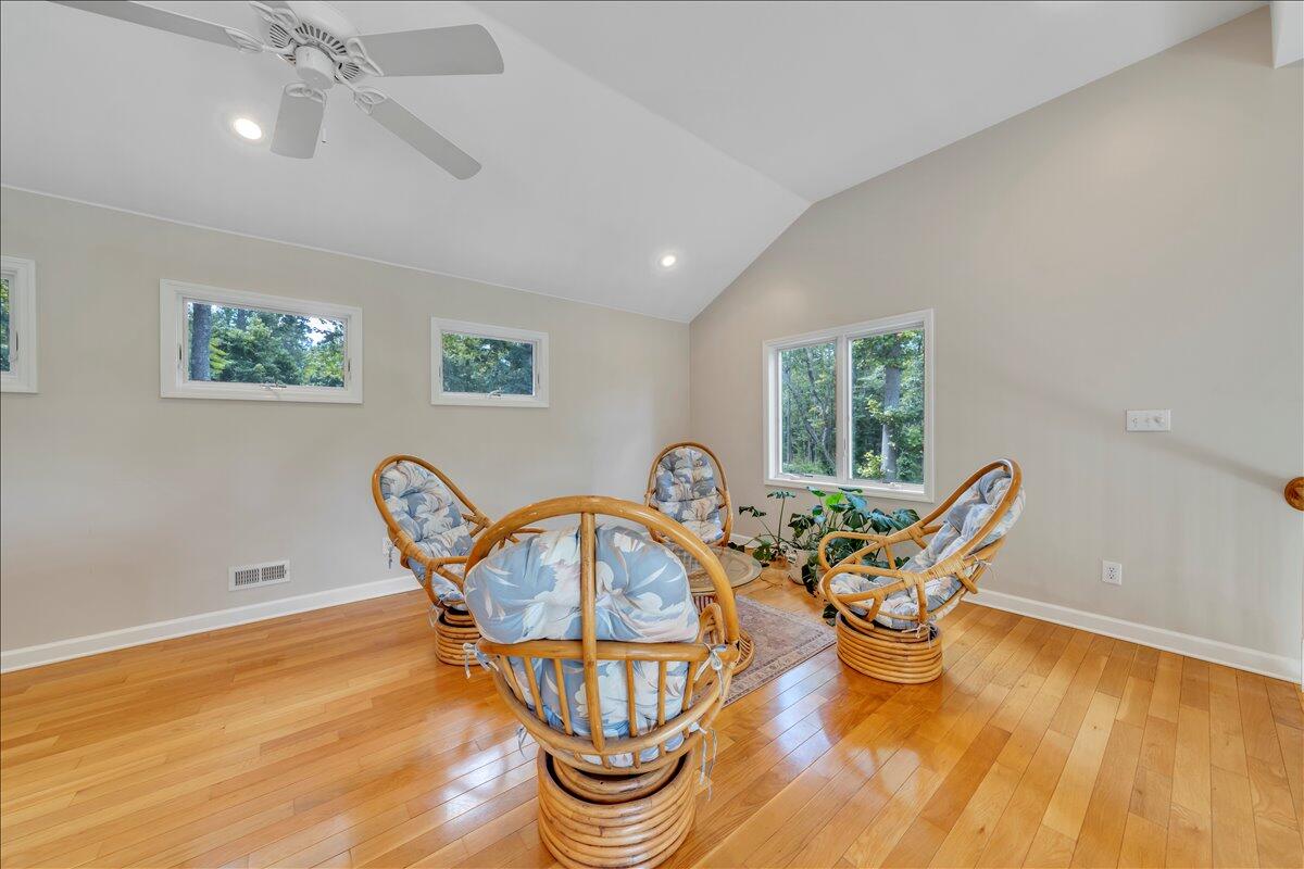 2011 Deep Woods Road Hardy, VA 24101 - Photo 32 of 94 a view of a dining room with furniture a chandelier and wooden floor