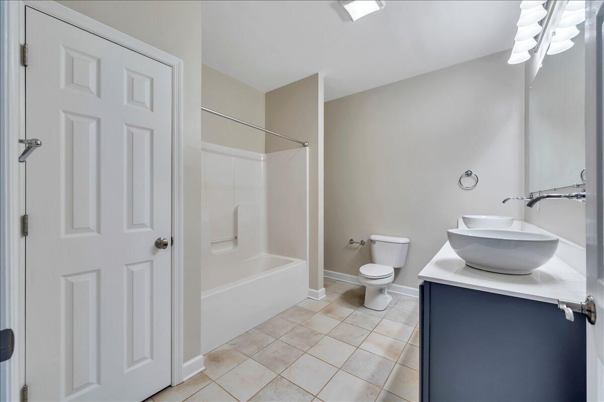 2011 Deep Woods Road Hardy, VA 24101 - Photo 45 of 94 a bathroom with a sink toilet and shower
