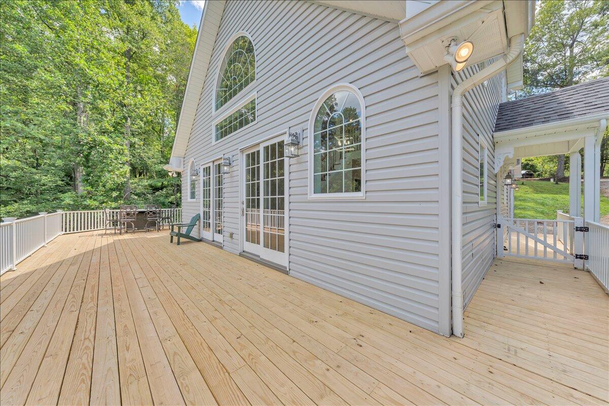 2011 Deep Woods Road Hardy, VA 24101 - Photo 55 of 94 a view of backyard with a deck and wooden floor