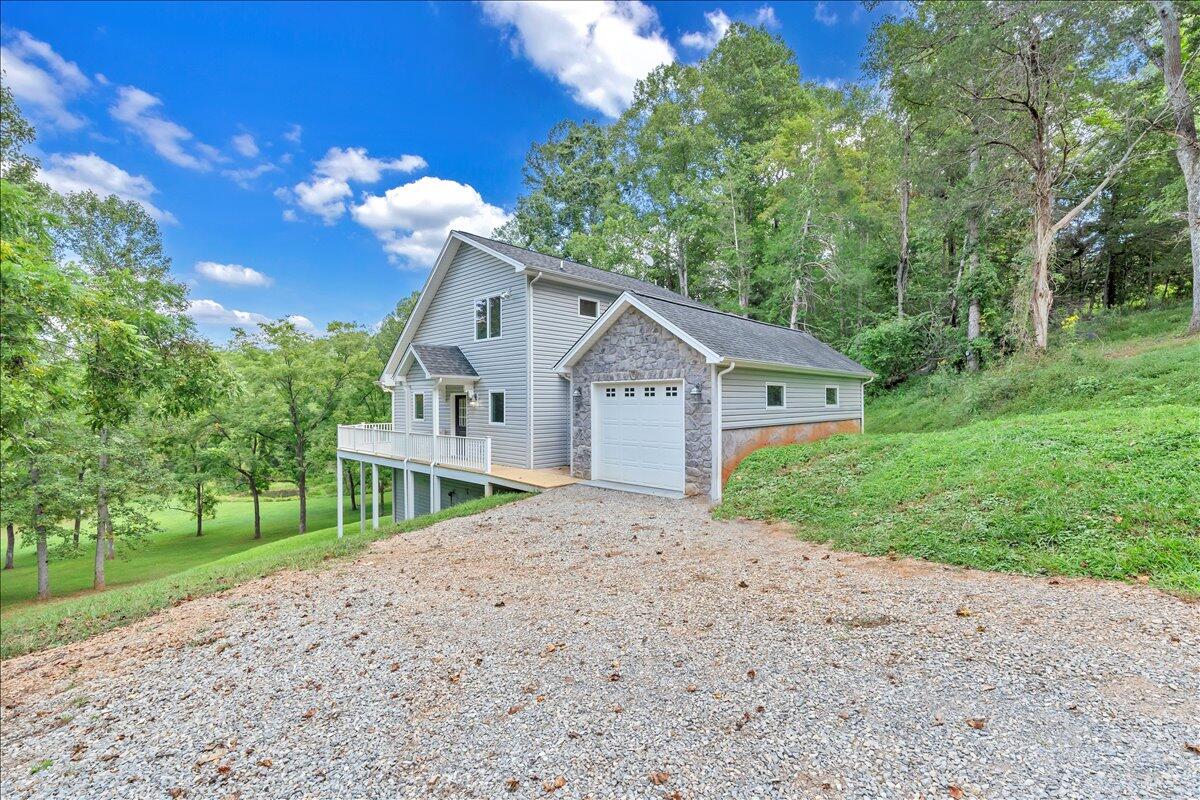 2011 Deep Woods Road Hardy, VA 24101 - Photo 59 of 94 a view of a house with a yard and large tree