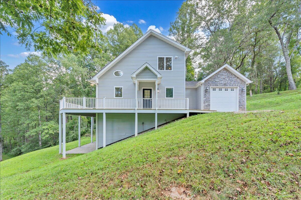 2011 Deep Woods Road Hardy, VA 24101 - Photo 61 of 94 a view of a house with a yard and large trees
