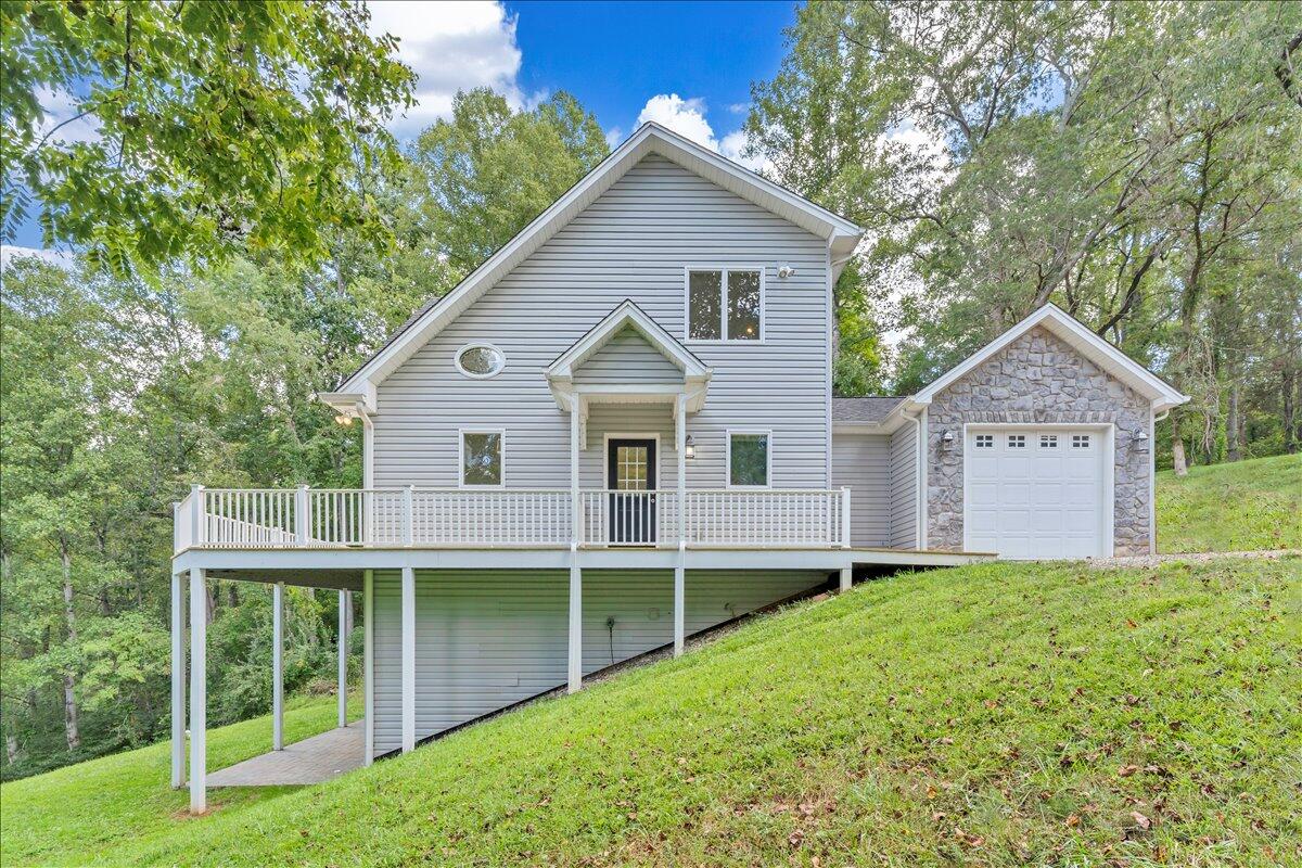 2011 Deep Woods Road Hardy, VA 24101 - Photo 62 of 94 a front view of a house with yard and green space