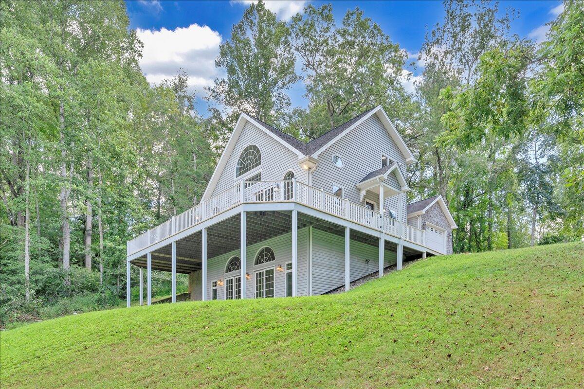 2011 Deep Woods Road Hardy, VA 24101 - Photo 63 of 94 a front view of a house with a garden