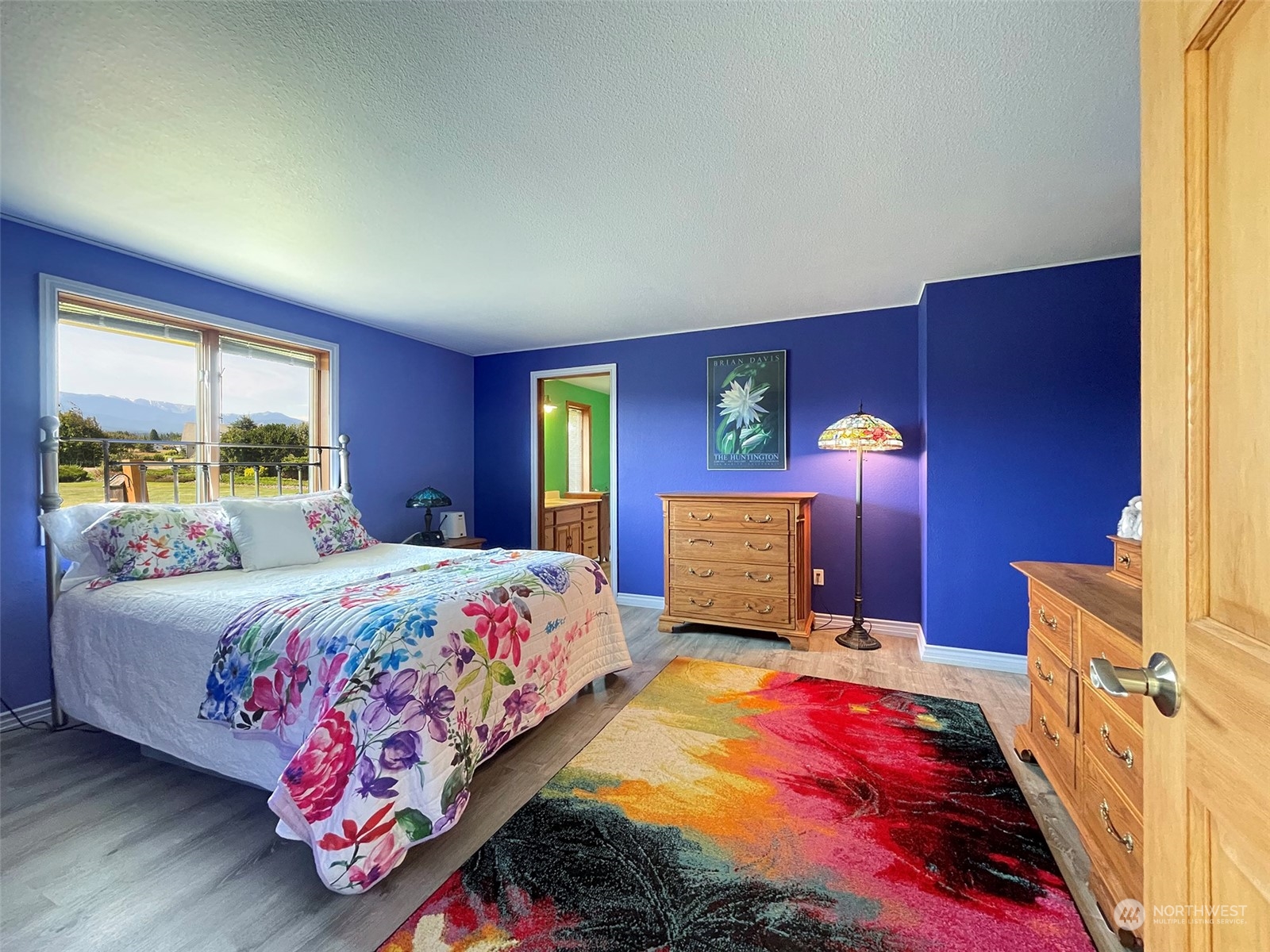 421 Greywolf Road Sequim, WA 98382 - Photo 20 of 40 a bedroom with a bed and a window