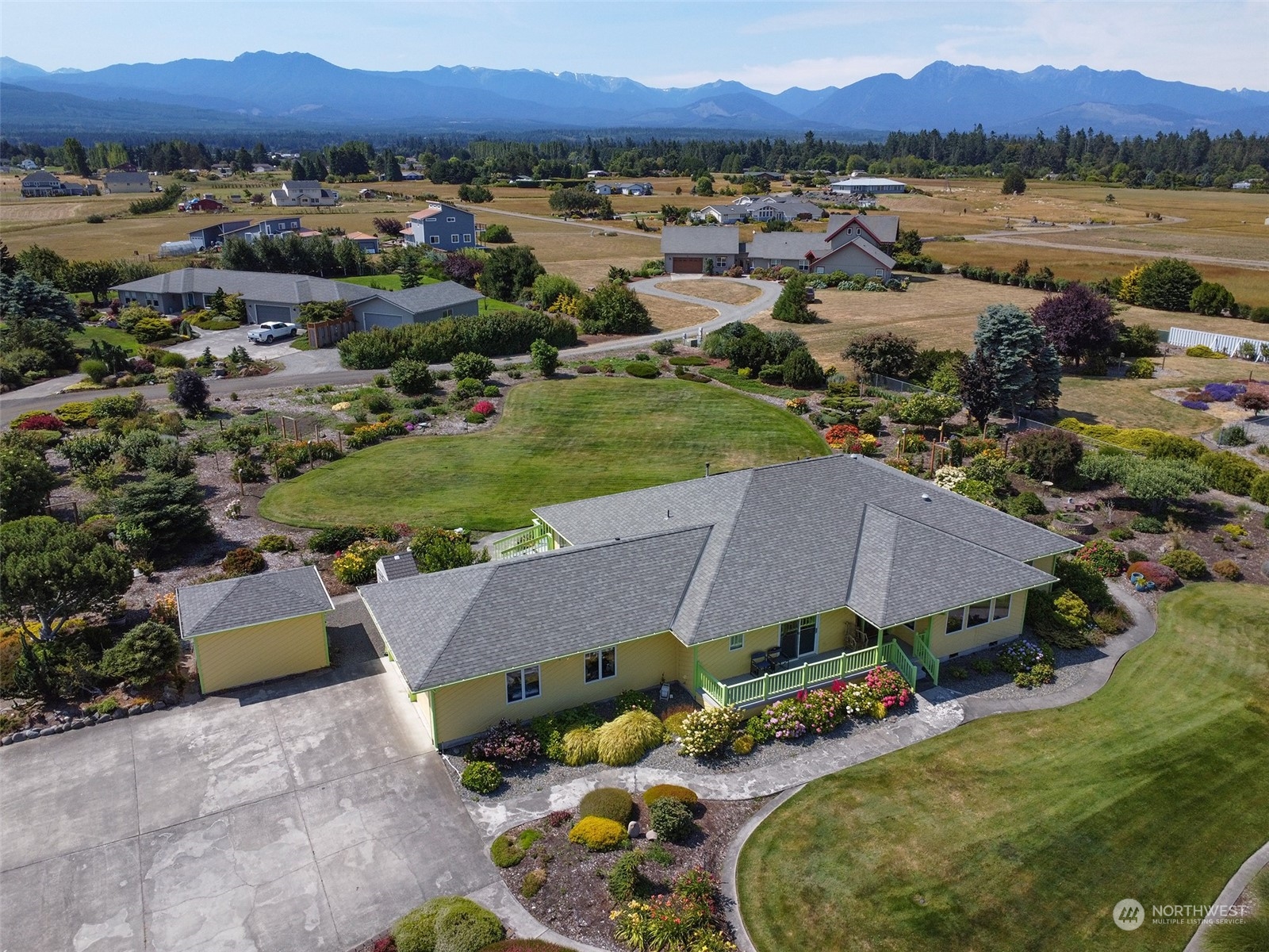 421 Greywolf Road Sequim, WA 98382 - Photo 2 of 40 an aerial view of residential houses and lake view