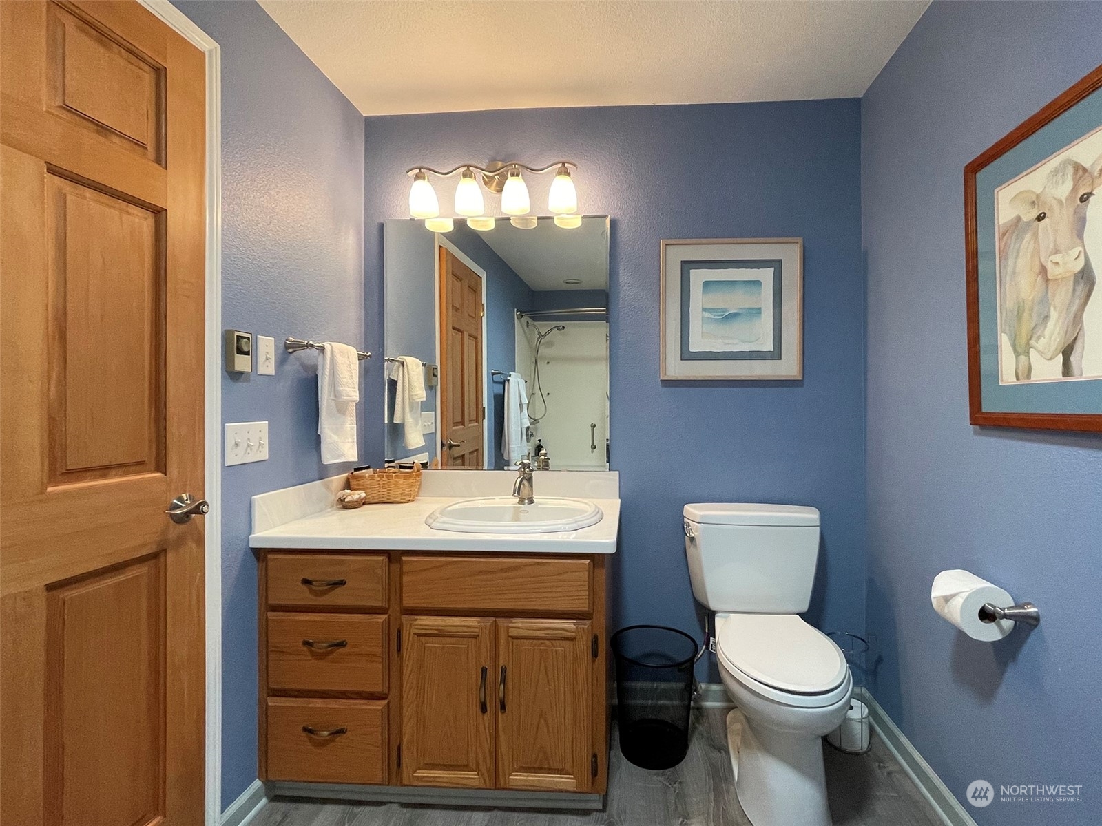 421 Greywolf Road Sequim, WA 98382 - Photo 25 of 40 a bathroom with a toilet sink and mirror
