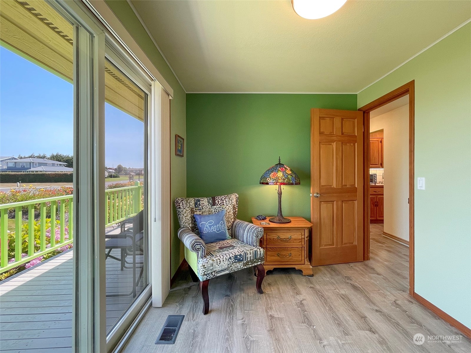 421 Greywolf Road Sequim, WA 98382 - Photo 27 of 40 a living room with furniture and a window