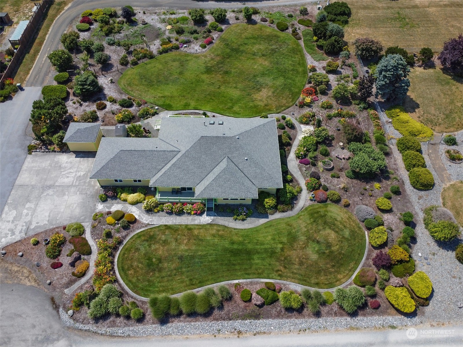 421 Greywolf Road Sequim, WA 98382 - Photo 5 of 40 an aerial view of a house with a swimming pool