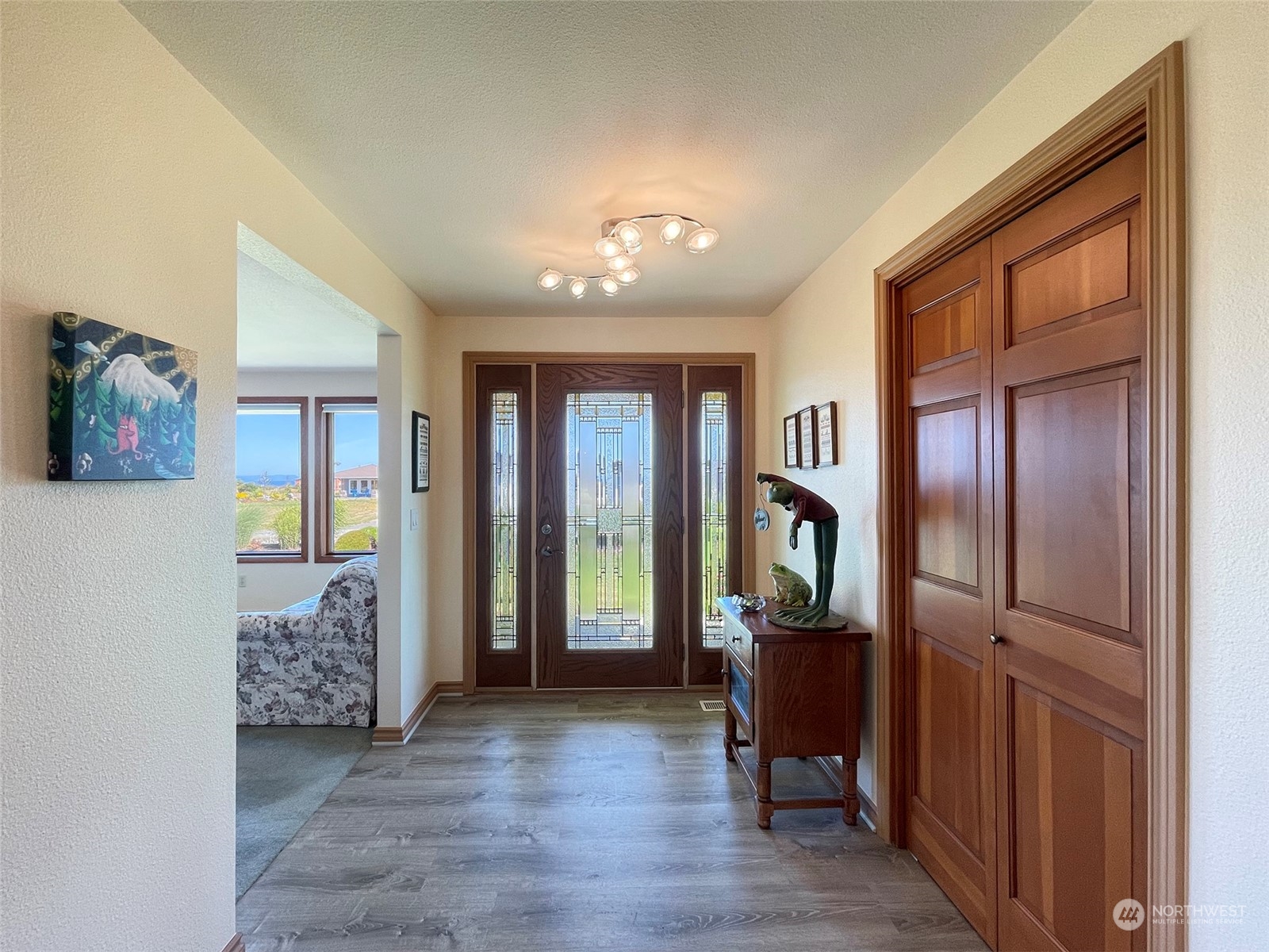 421 Greywolf Road Sequim, WA 98382 - Photo 6 of 40 a view of a hallway view with living room and furniture