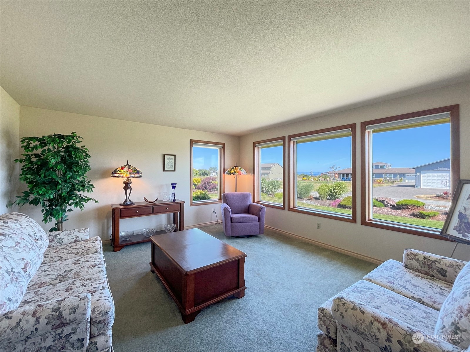 421 Greywolf Road Sequim, WA 98382 - Photo 7 of 40 a living room with furniture and a large window