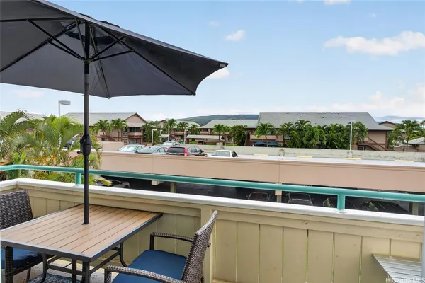 a view of a terrace with sitting area
