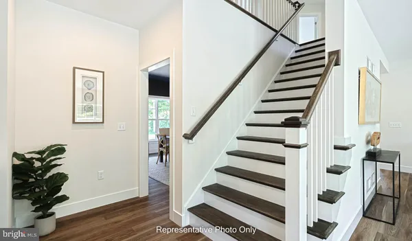 a view of entryway with wooden floor