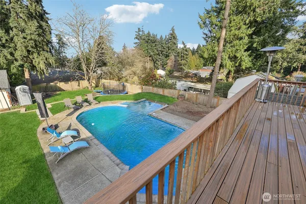 a view from deck with patio