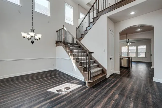 a view of entryway with wooden floor