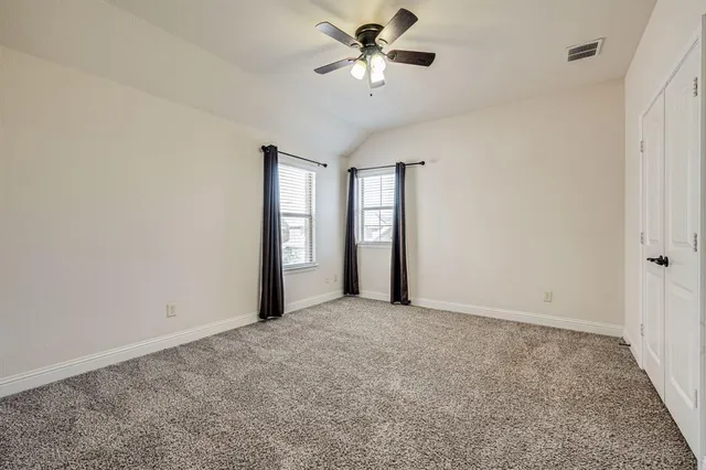a view of a big room with carpet
