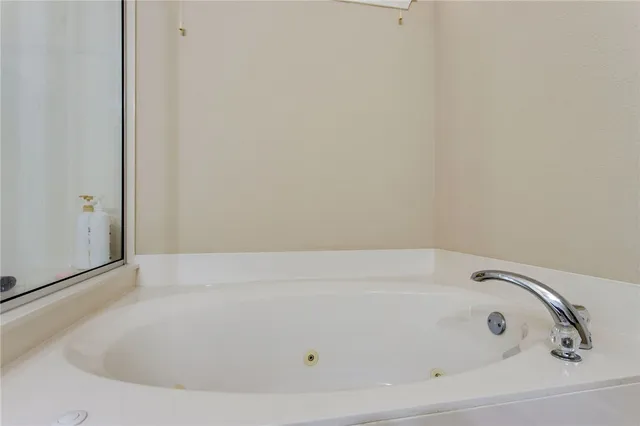 a bathroom with bathtub