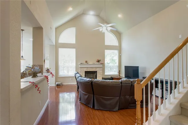a living room with furniture fireplace and a flat screen tv