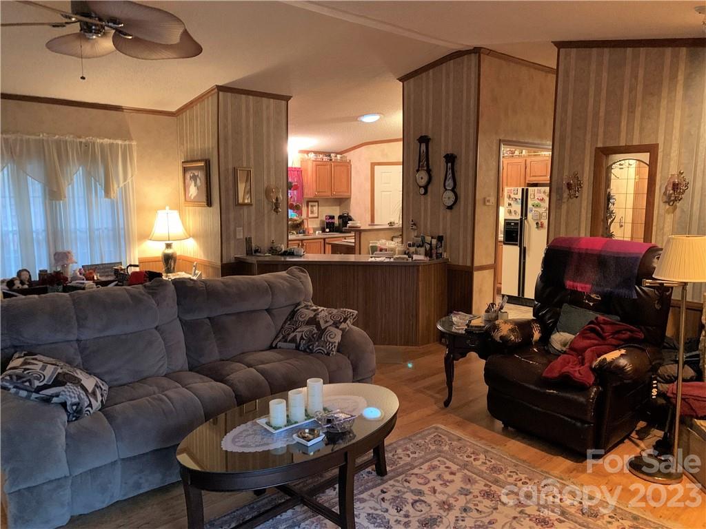 123 Beech Tree Lane Rutherfordton, NC 28139 - Photo 11 of 48 a living room with furniture and a large window