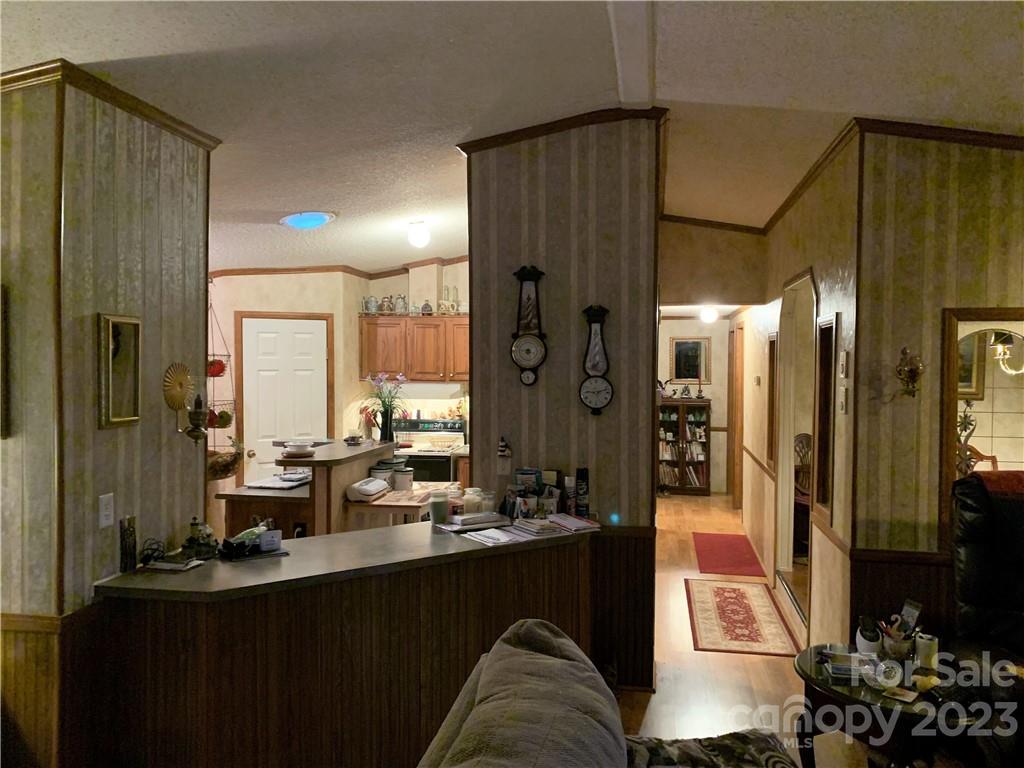 123 Beech Tree Lane Rutherfordton, NC 28139 - Photo 12 of 48 a living room with stainless steel appliances kitchen island granite countertop furniture a refrigerator and a sink
