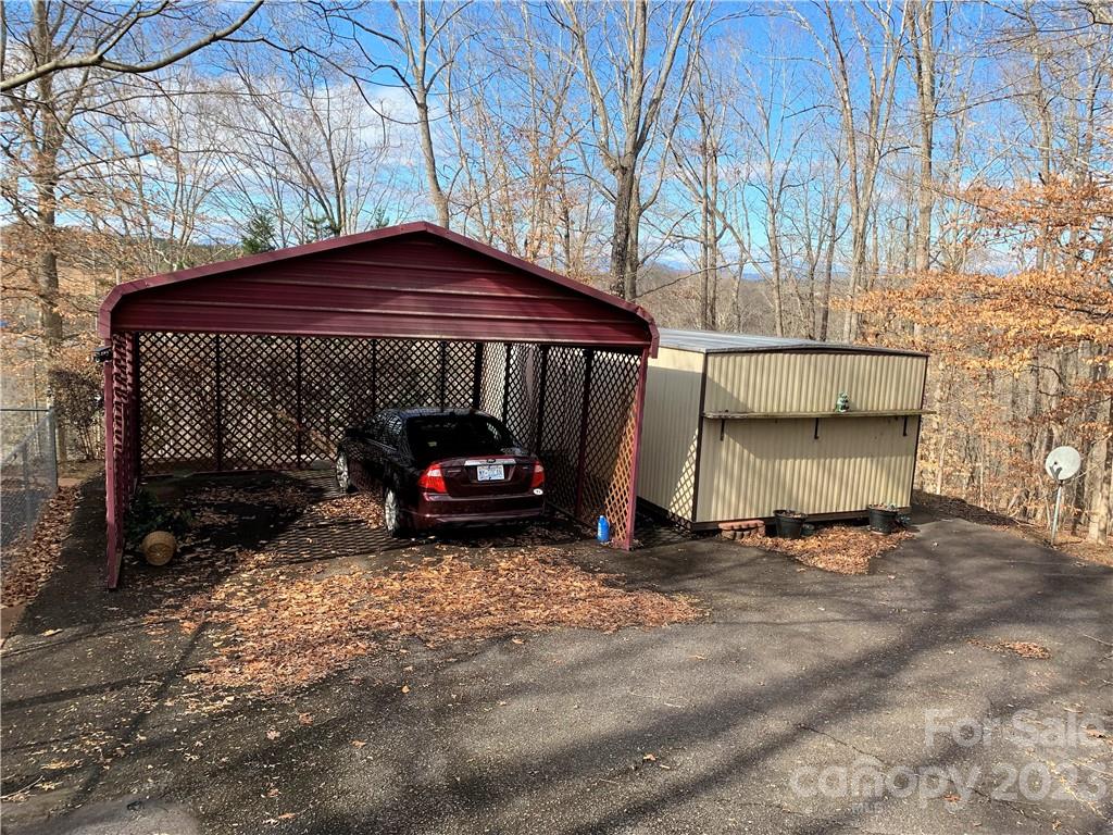 123 Beech Tree Lane Rutherfordton, NC 28139 - Photo 38 of 48 a view of a house with a yard and parking space