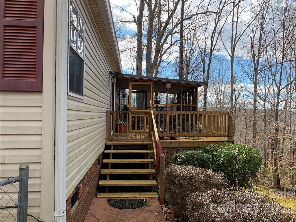123 Beech Tree Lane Rutherfordton, NC 28139 - Photo 43 of 48 a view of a house with backyard and deck