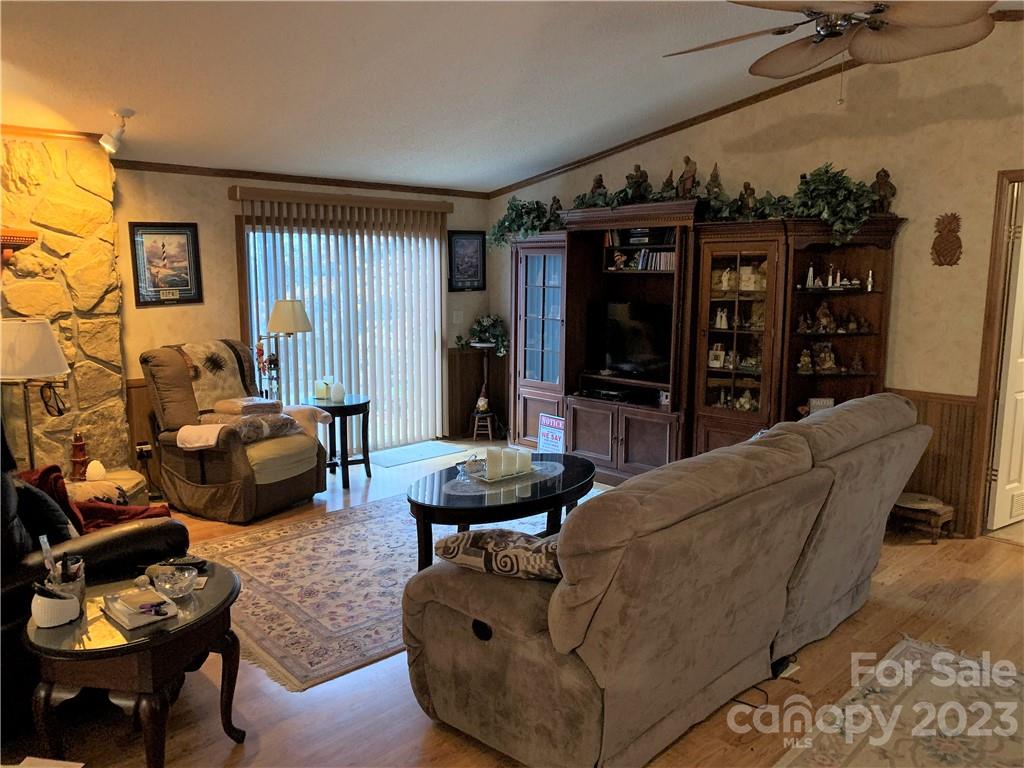123 Beech Tree Lane Rutherfordton, NC 28139 - Photo 6 of 48 a living room with furniture and wooden floor