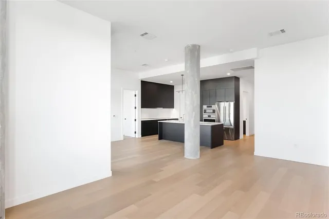 an empty room with window