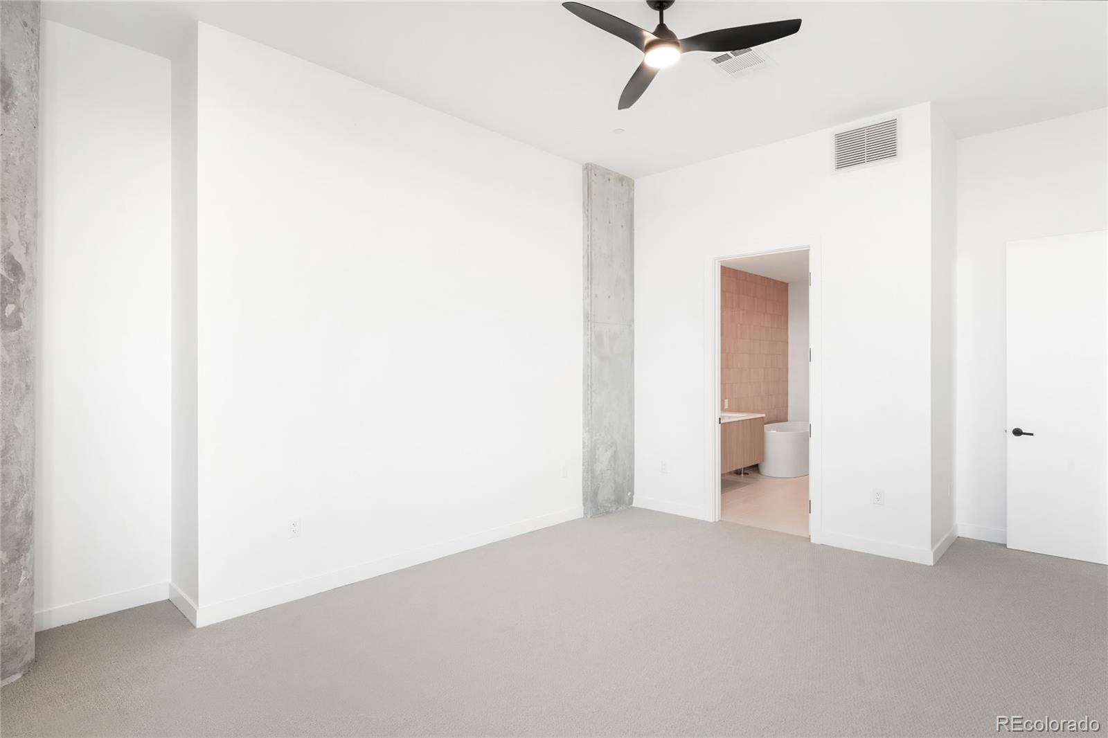 3520 Chestnut Place, Unit PH1202 Denver, CO 80216 - Photo 13 of 41 a view of a room with a ceiling fan