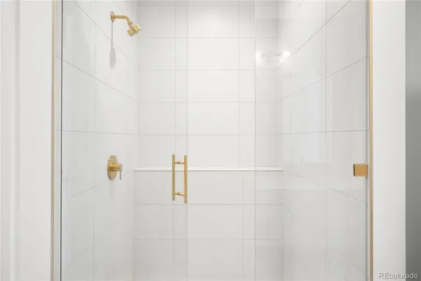 a bathroom with a bathtub and a sink