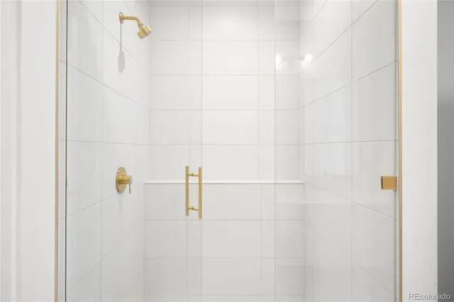 a bathroom with a bathtub and a sink