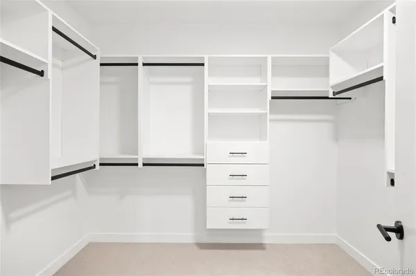 an empty room with large window