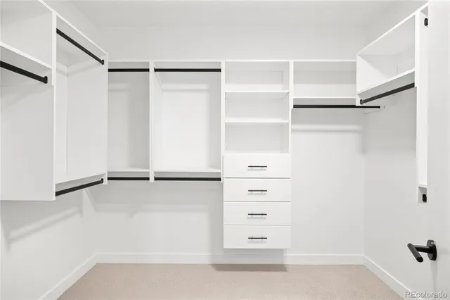 an empty room with large window