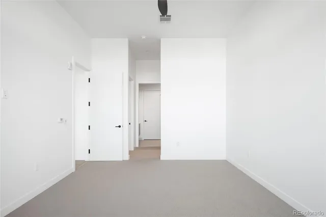 a bathroom with a shower sink and mirror