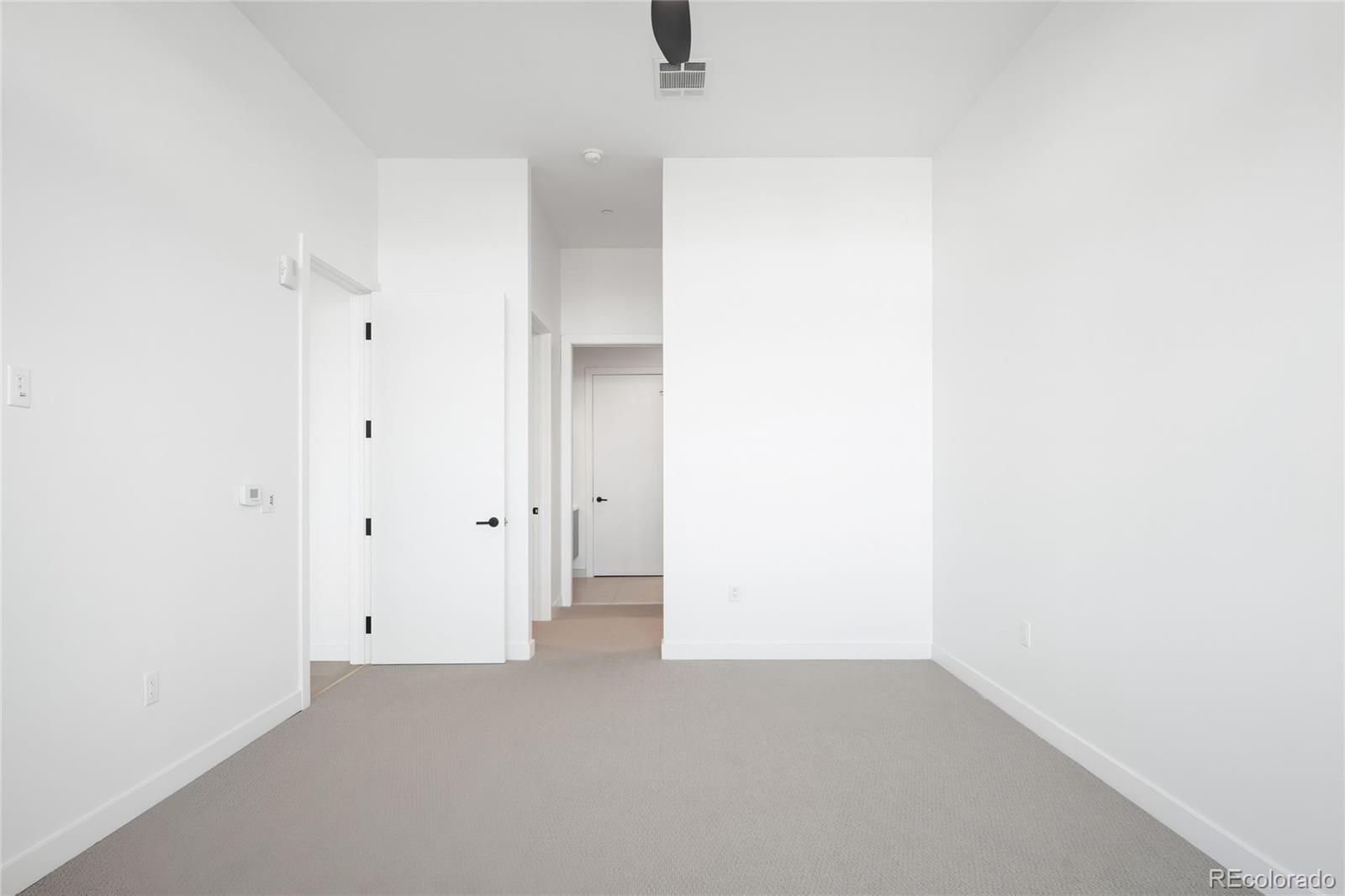 3520 Chestnut Place, Unit PH1202 Denver, CO 80216 - Photo 19 of 41 a view of an empty room