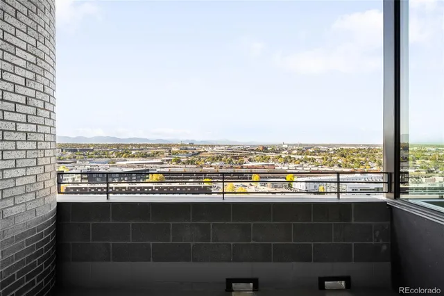 a view of a glass door and a window