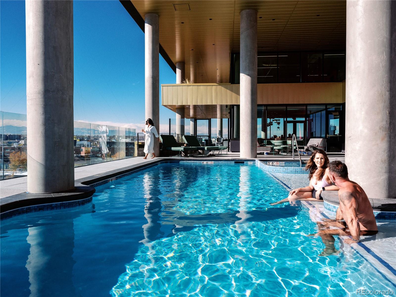 3520 Chestnut Place, Unit PH1202 Denver, CO 80216 - Photo 29 of 41 a view of a lake with a house