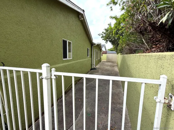 a view of a yard with trees