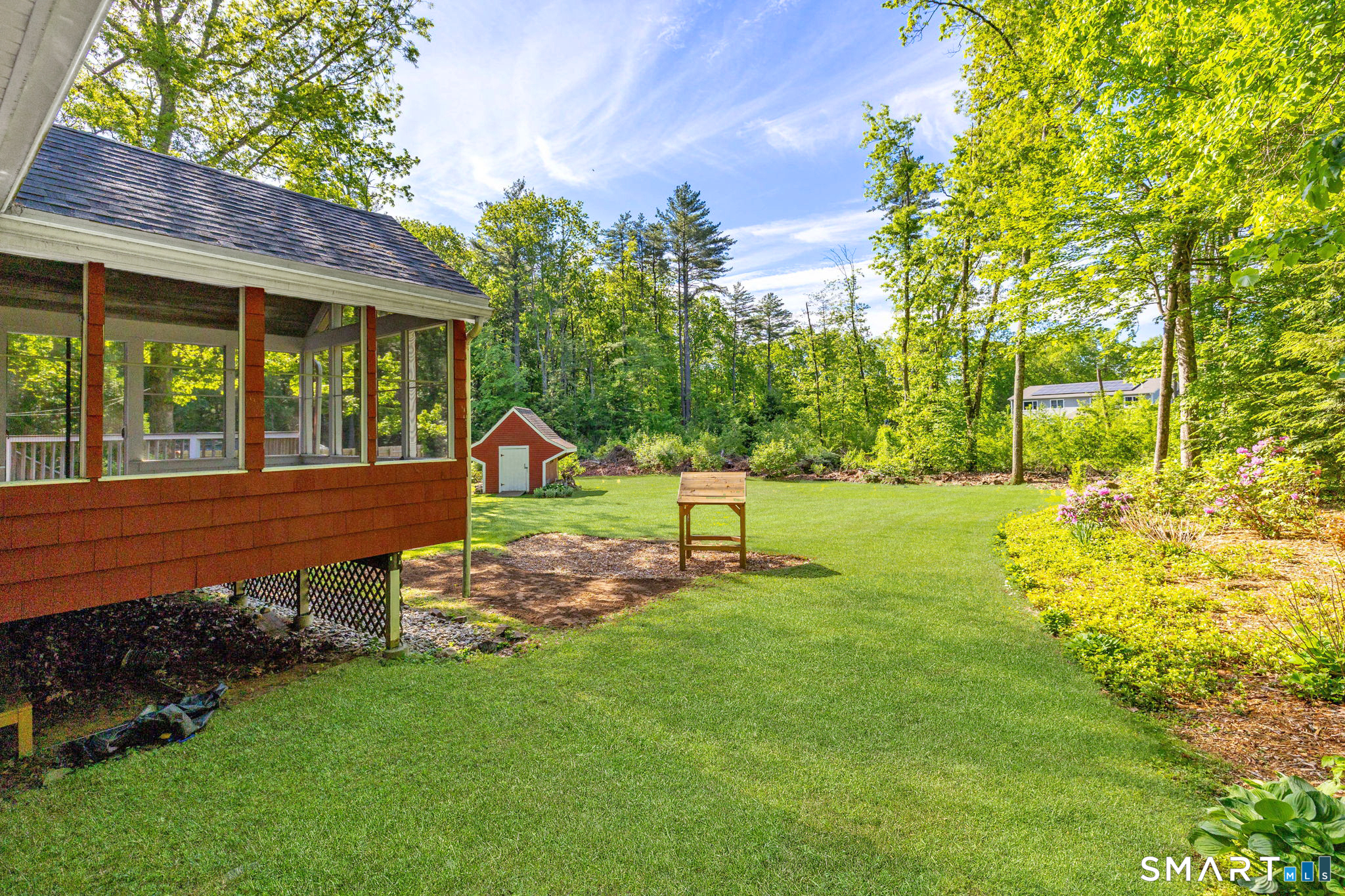 347 Griffin Road Suffield, CT 06093 - Photo 2 of 35 a garden view with a seating space