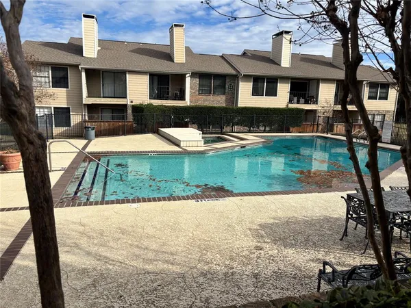 a view of a house with swimming pool