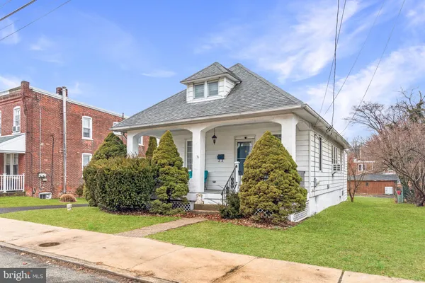 a view of a livingroom with furniture and wooden floor