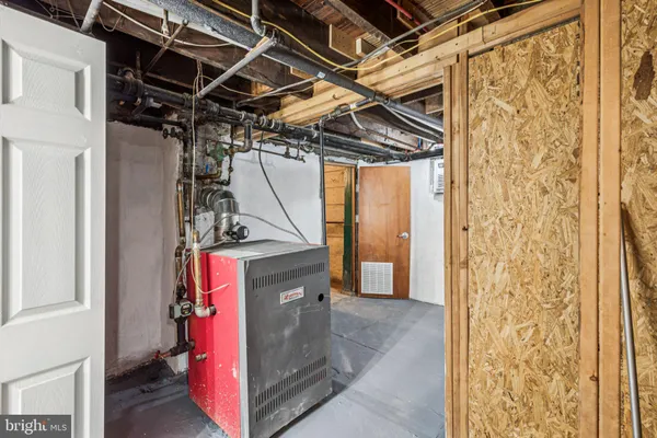 a bathroom with a bathtub a sink a toilet and shower